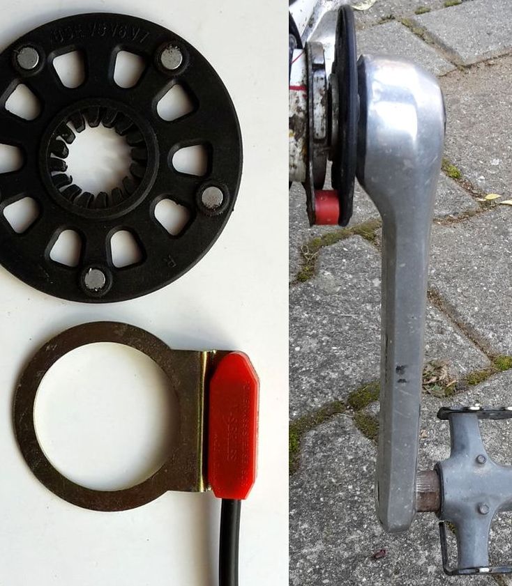 A pedal-assist sensor: a magnet disc and red Hall sensor, shown loose and fitted behind the crank
